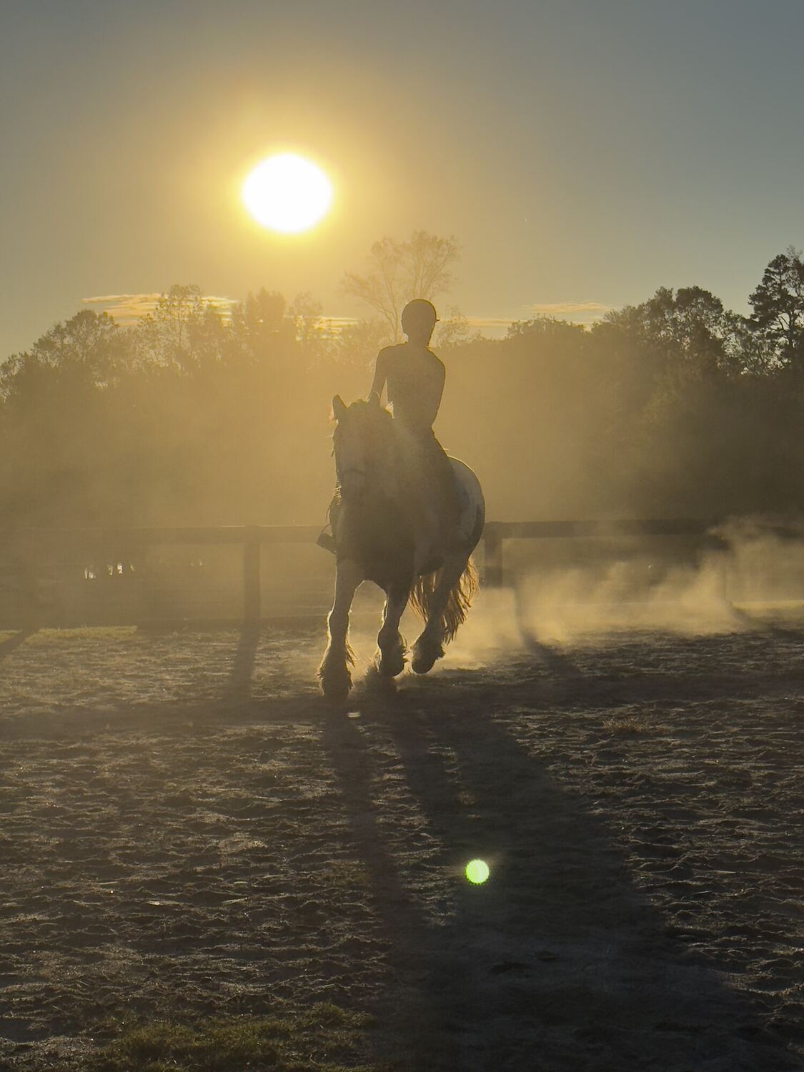 Lydia riding at sunrise
